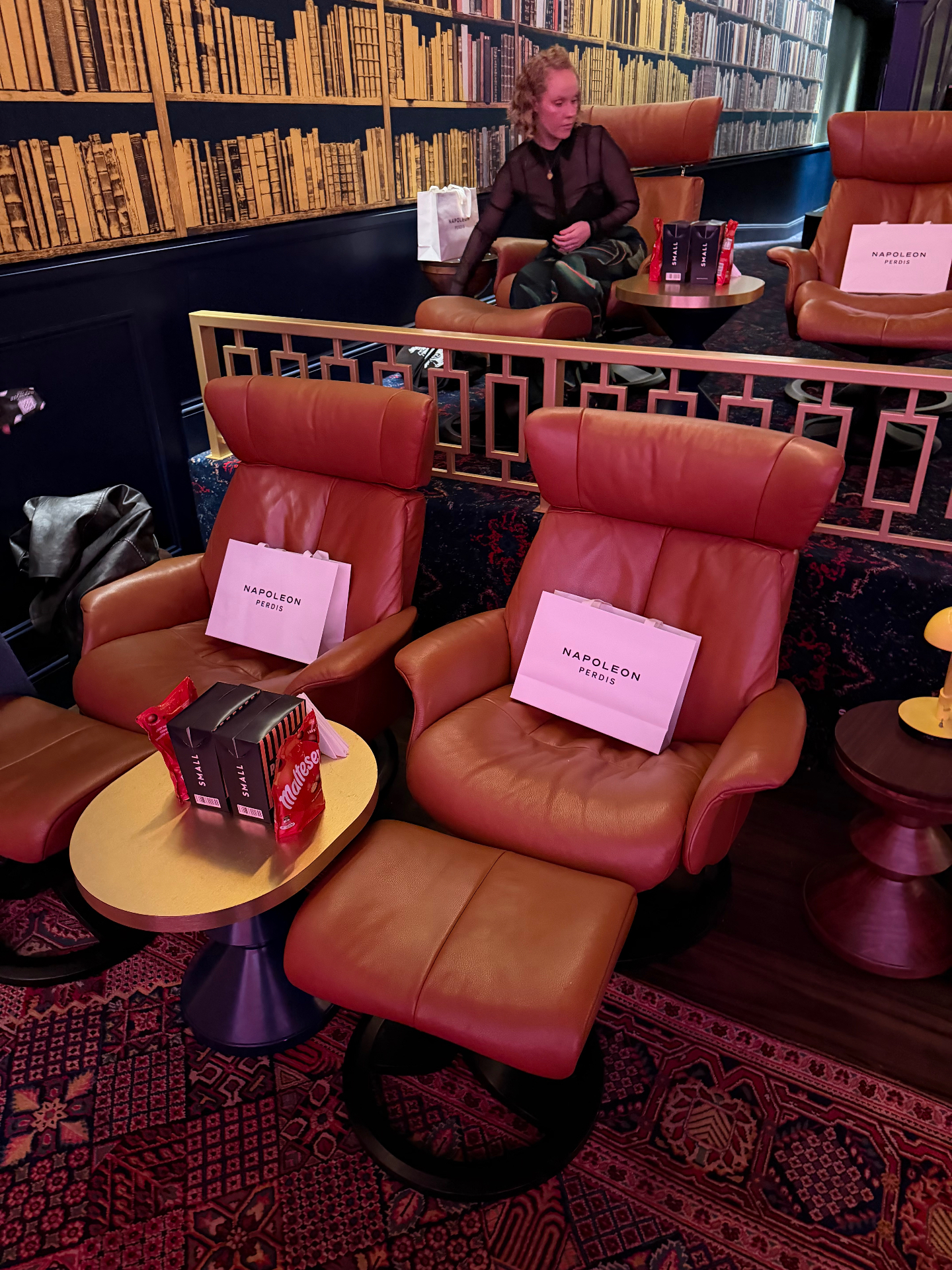Gold class cinema recliners with Napoleon Perdis goodie bags, Maltesers and popcorn waiting on the seats for YSO members.
