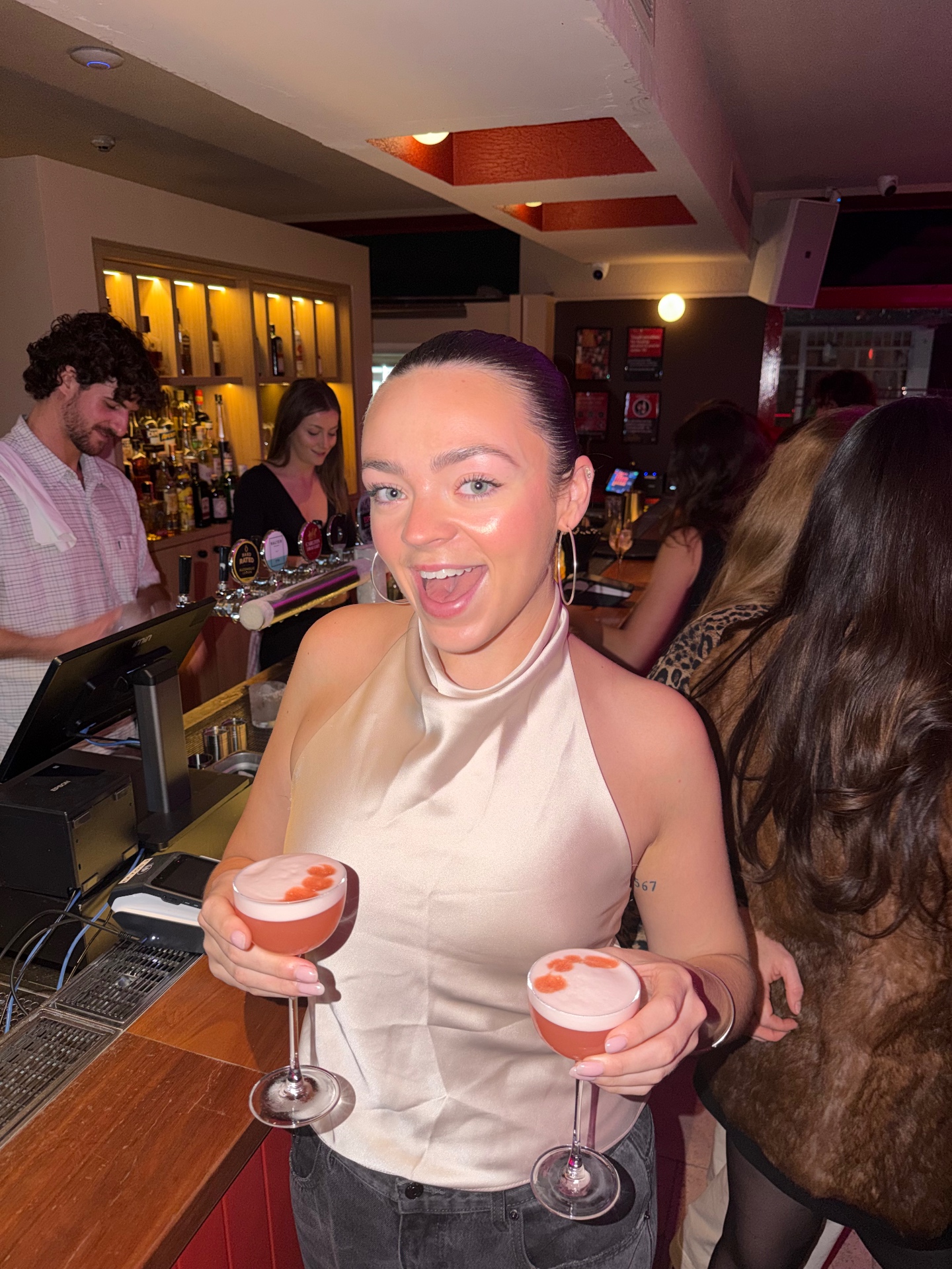 The signature 'Roxanne' cocktail at DrGoodes Sydney — a blush-pink Aperol and strawberry sour served in a coupe glass, one of the best craft cocktails in Paddington's late-night bar scene.