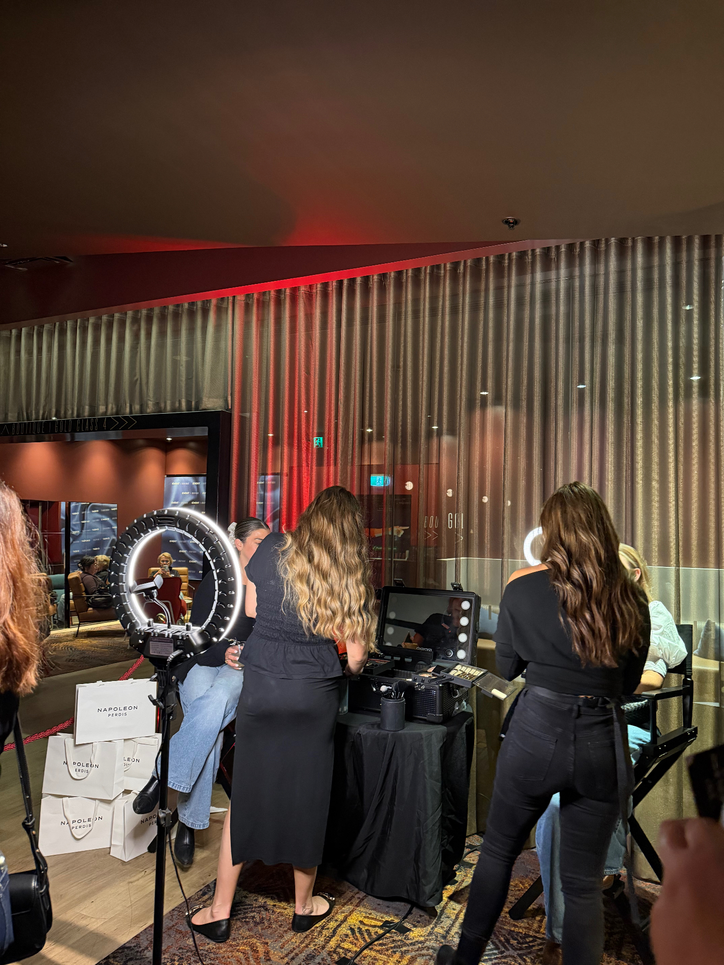 Napoleon Perdis makeup station with a ring light and goodie bags set up in the cinema lobby for the YSO cinema club night.