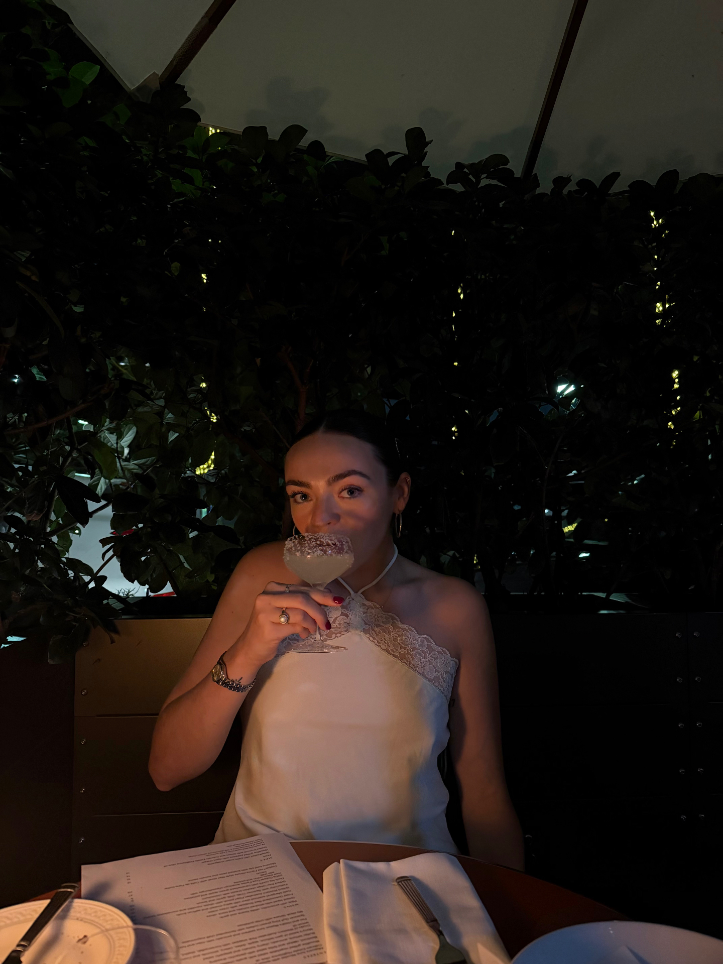 Holly Folkard-Smith sipping a salt-rimmed cocktail at a candlelit Sydney restaurant — the opener for the May 2026 round-up of the best places to eat in Sydney.